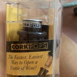 Cork pops wine opener